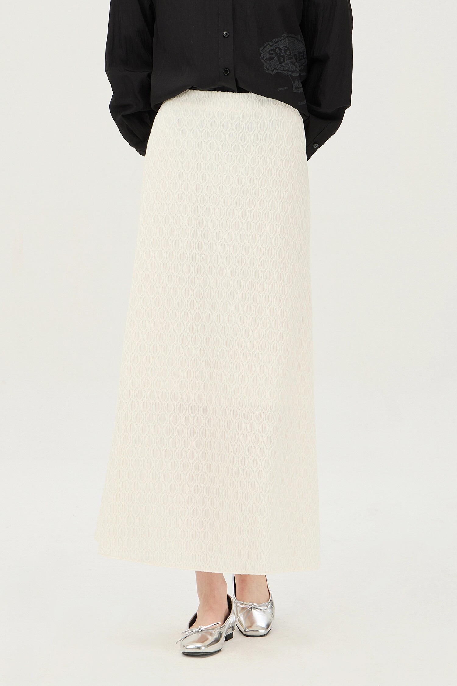 상세참조 베네통(아울렛) 엠보패턴롱스커트BASK02511