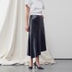 [리이][리이] ASYMMETRIC VEGAN LEATHER SKIRT BLACK